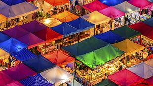 yellow, blue, and red textile, markets, night