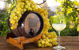 green grapes on brown barrel