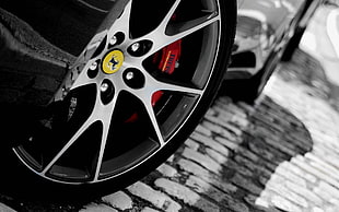 chrome multi-spoke vehicle wheel and tire, Ferrari, rims, brakes, black metal