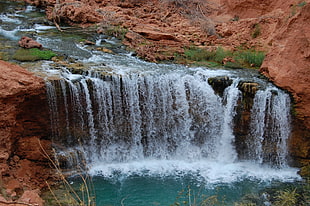landscape photography of continues flow of water falls