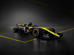 black and yellow F1 die-cast toy