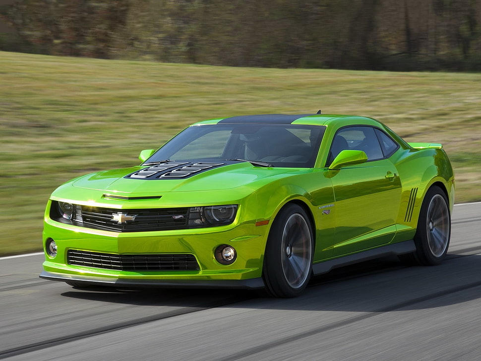 green Chevrolet Camaro on road time lapse photography HD wallpaper
