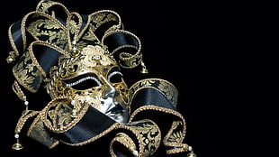 black and brown floral masquerade mask with black background