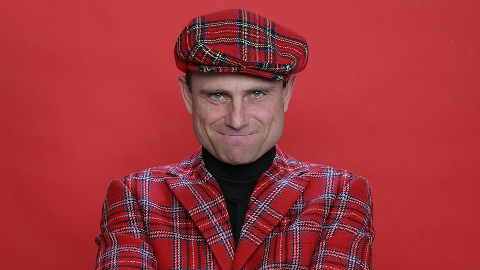 man wearing red and gray plaid top with hat HD wallpaper