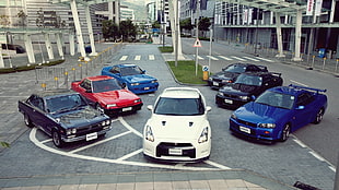 assorted-color cars on road during daytime HD wallpaper