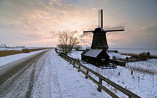 photo of windmill cover in snow