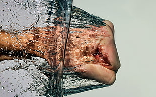 fist in water close up photo