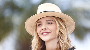Chloe Moretz in beige straw hat