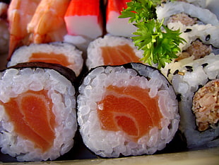 closeup photo of bunch of sushi