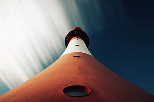 low angle photo of white and brown lighthouse, worm's eye view, sky, building, lighthouse