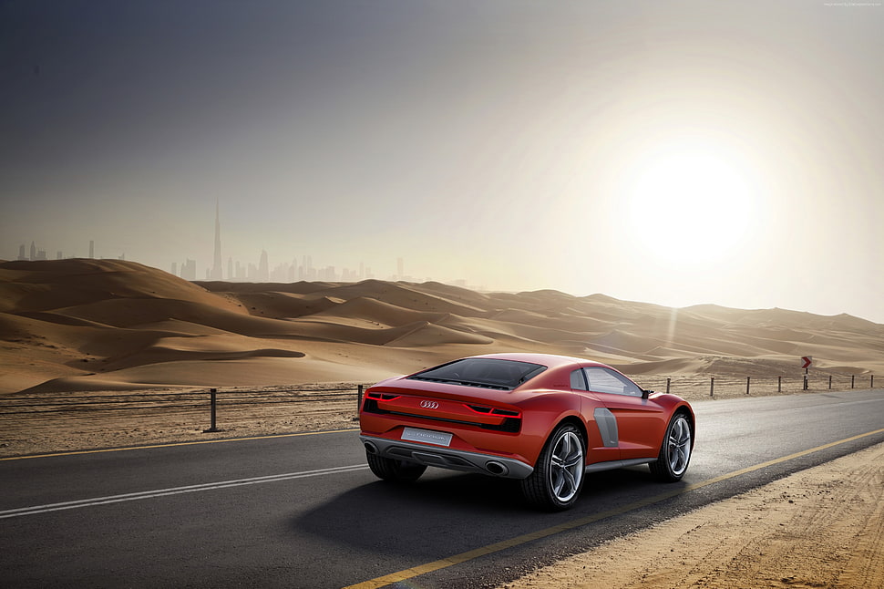 red sports car on concrete road HD wallpaper