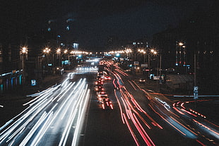 time lapse photo of cars on road at night tume