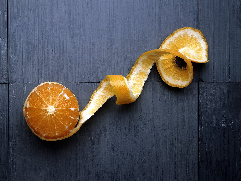 Orange fruit on black table HD wallpaper