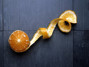 Orange fruit on black table HD wallpaper