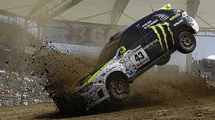photo of rally car landing on dirt HD wallpaper