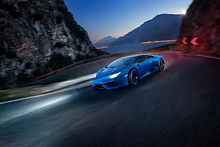 blue Lamborghini Murcielago drifting on curved road during dusk time lapse photography HD wallpaper