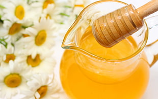 honey on clear glass pitcher HD wallpaper