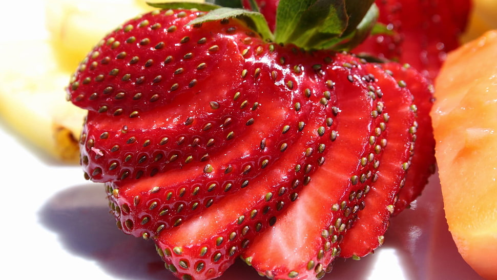 sliced strawberry fruit HD wallpaper