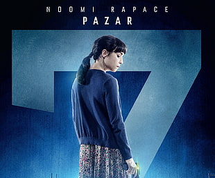 woman wearing blue sweater standing