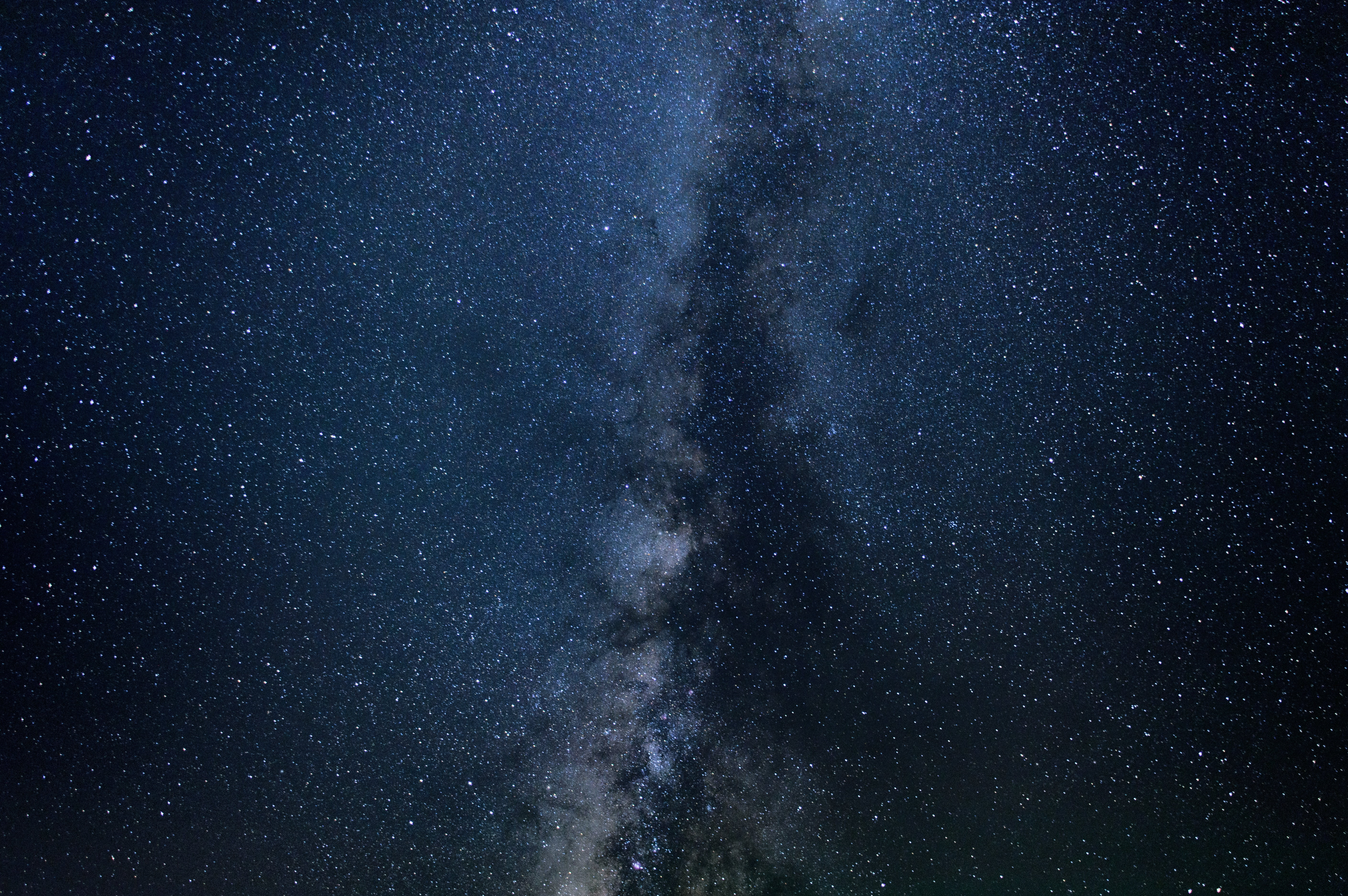 photo of black and blue galaxy