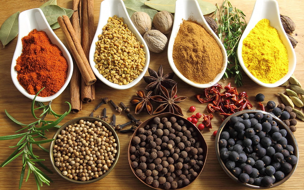 assorted condiments on brown wooden table HD wallpaper