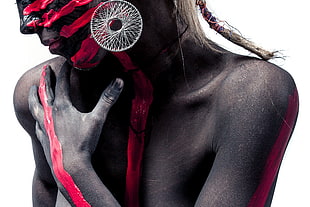 woman in black and red body paint