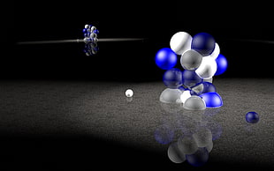 two white-and-blue compressed bubbles on the floor