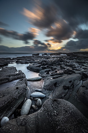 selective focus photography of gray stones near body of water, liscannor, ireland HD wallpaper