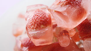 macro photograph of strawberry covered with ice