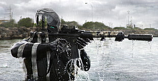 man holding rifle standing in middle of water body HD wallpaper