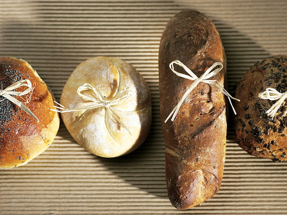 close up photography og four baked breads HD wallpaper