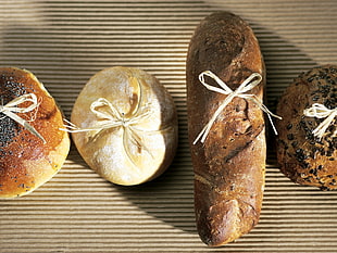 close up photography og four baked breads