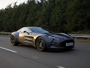 time lapse photography of black Aston Martin One 77 on pavement HD wallpaper