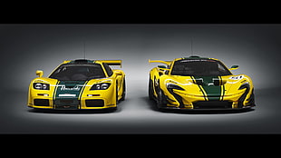 two yellow and green race cars