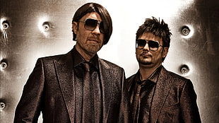 two man standing side by side wearing black suit HD wallpaper