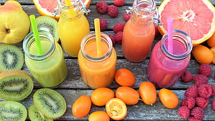 variety of fruits and fruit juice during daytime