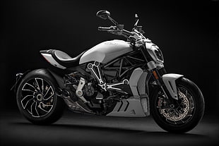 white and black naked motorcycle