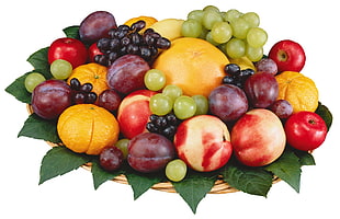 assorted fruits on brown wicket basket