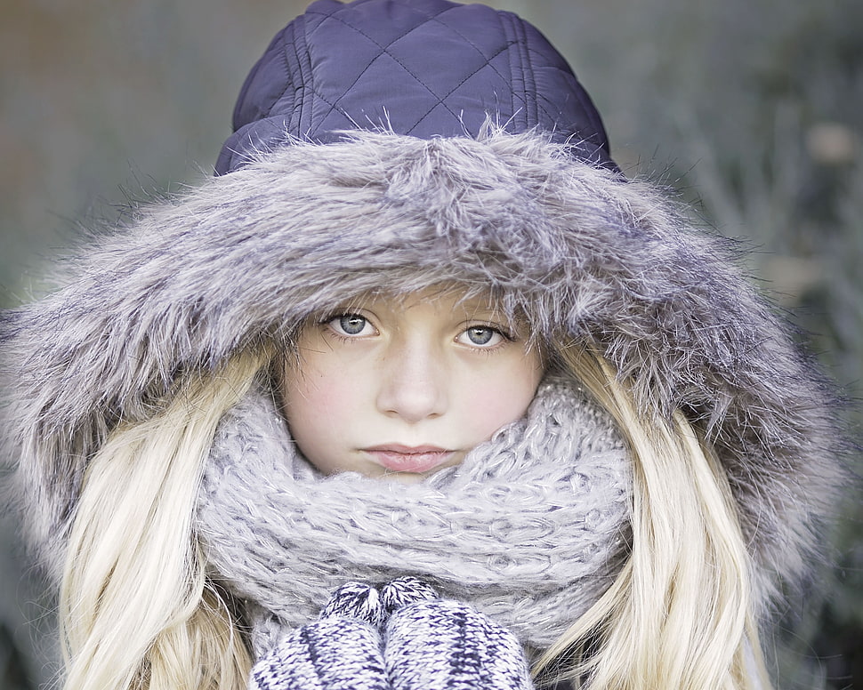 selective focus photography of girl wearing blue coat and white scarf HD wallpaper