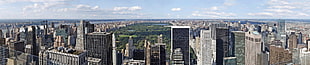 gray high-rise building, New York City, triple screen