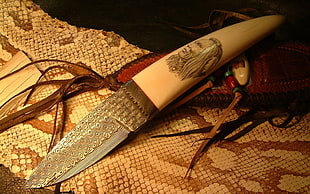 gray and brown knife, knife, skin, face, one of a kind