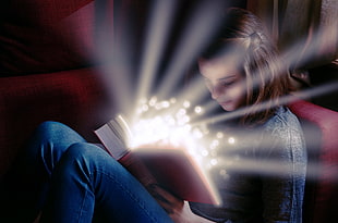 girl looking at glowing red book HD wallpaper