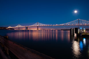 photography of bridge during nighttime HD wallpaper
