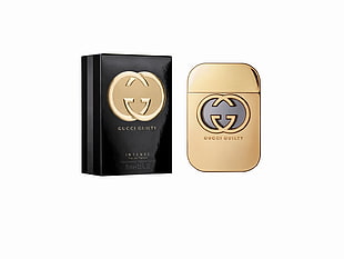 brown Gucci Guilty fragrance bottle with box HD wallpaper
