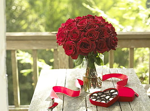 red rose bouquet on table