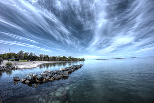 body of water under cloudy sky, toronto