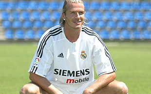 man wearing white Siemens Mobile soccer jersey