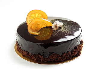 chocolate cake with sliced of lemons on top