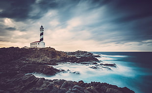 white and black lighthouse, sky, lighthouse, sea, coast