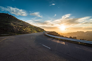photo of asphalt road during golden hour